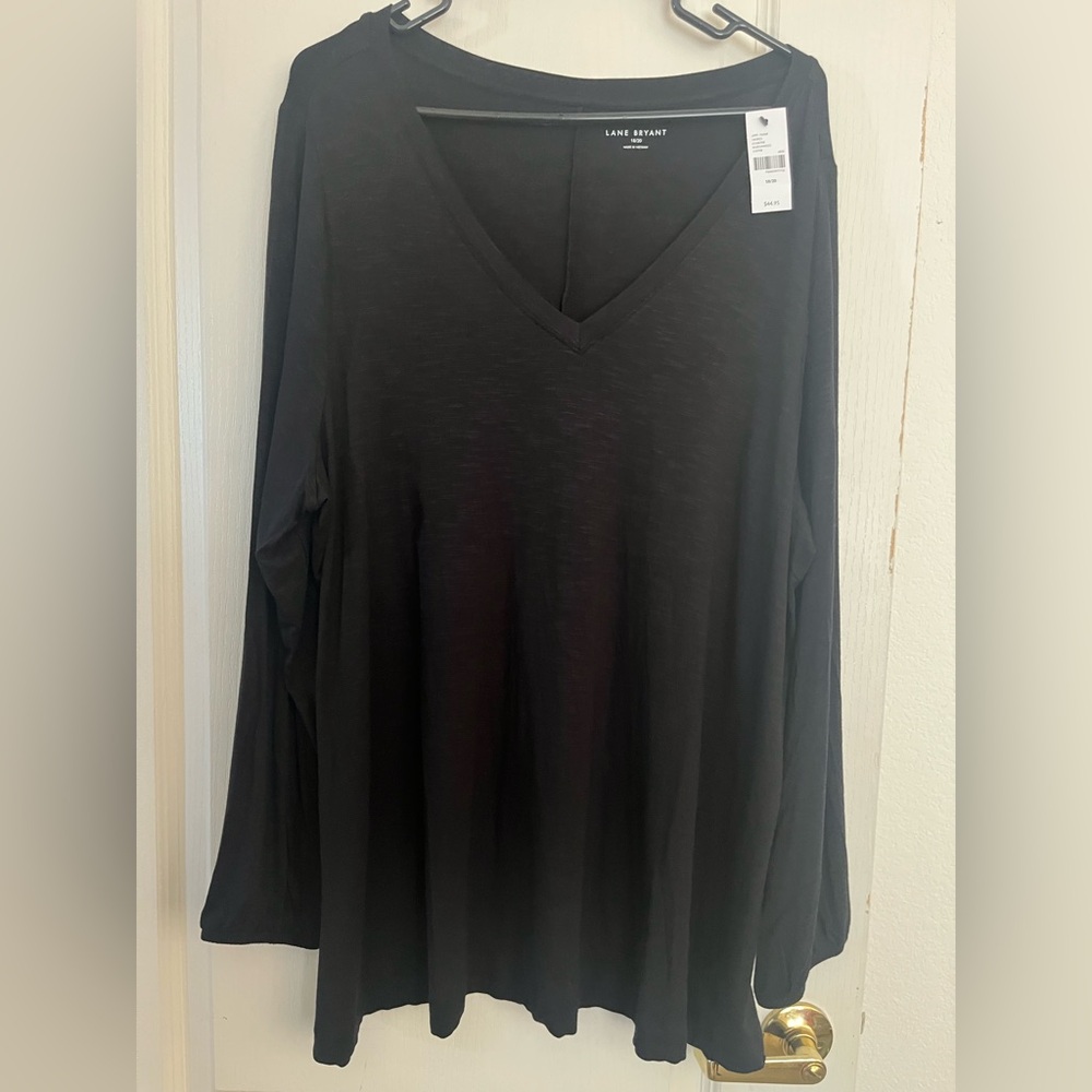 Lane Bryant NWT black top. Sleeves elastic around the waist.  2X. 18/20